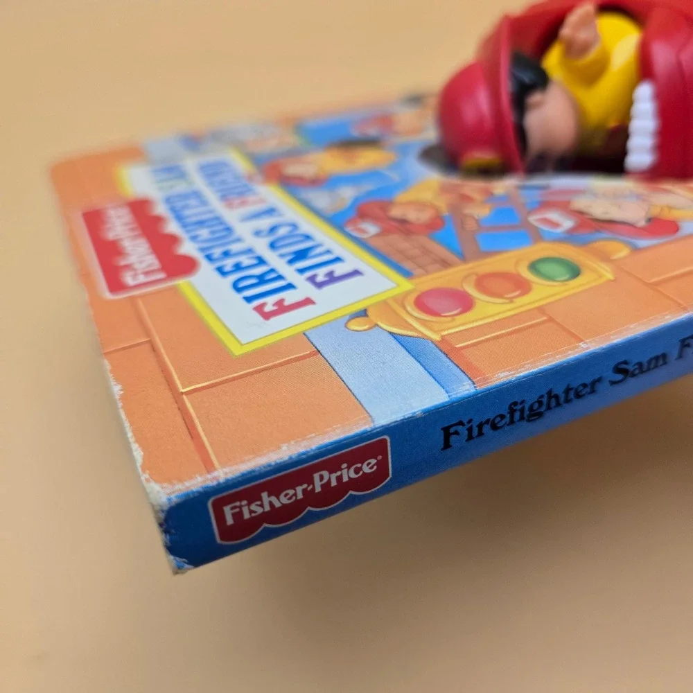 Fisher-Price Little People Firefighter Sam Finds a Friend Board Book Toy 1997